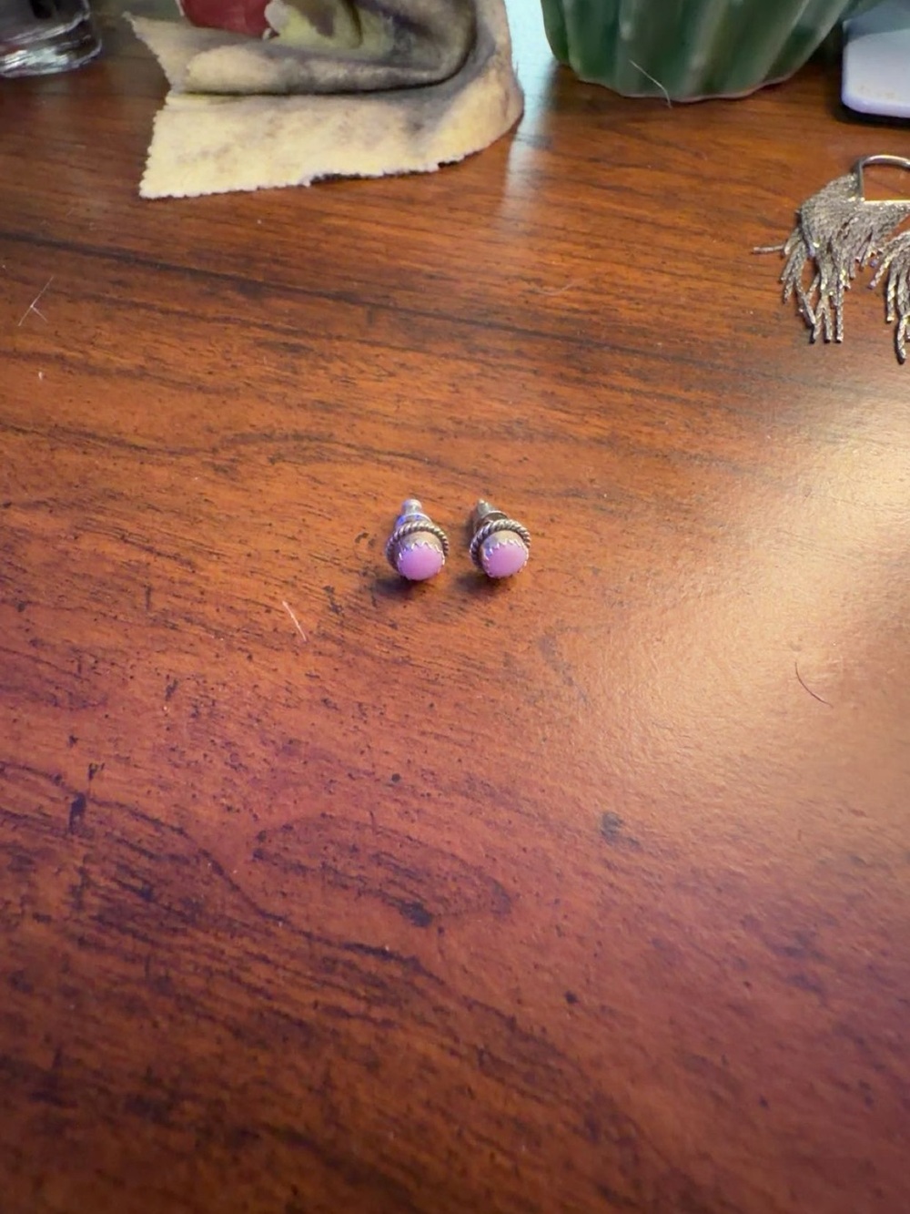 Pink conch stud earrings